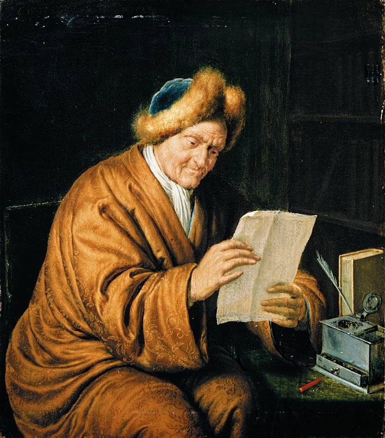 Vecchio uomo che legge